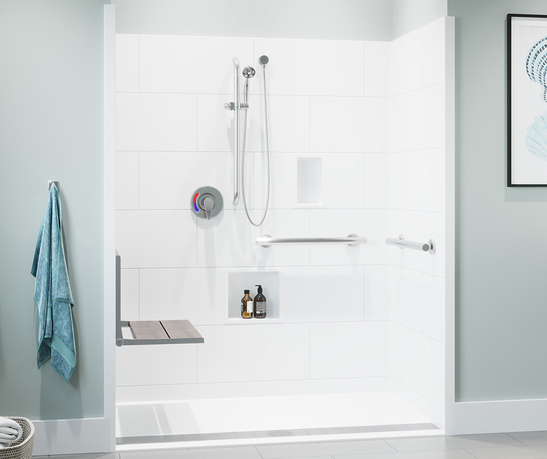 Image of a shower that has a foldable seat and hand held shower head.