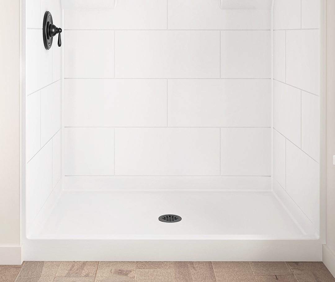 Image of a white tiled shower that is low threshold.