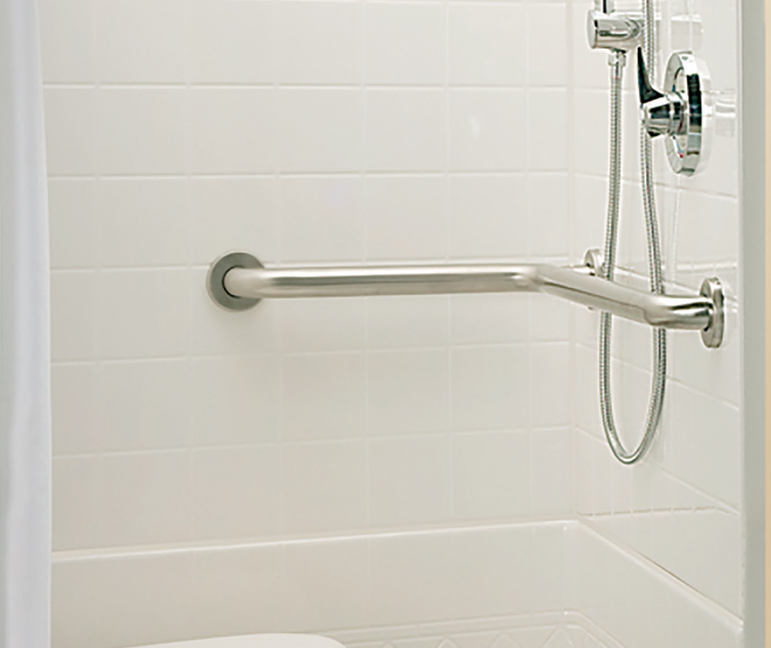 Image of chrome railings to reinforce the shower wall.