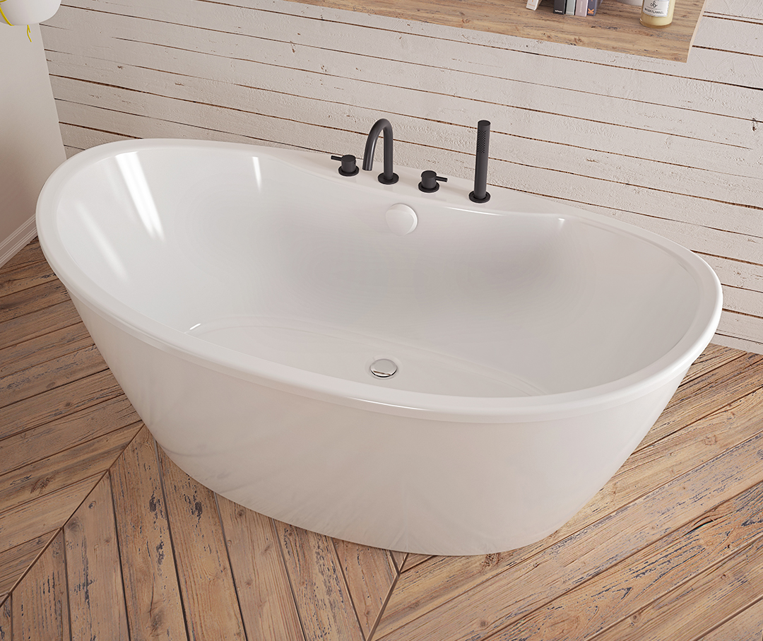 Oval shaped deep soaking tub in a bathroom on a wood floor.
